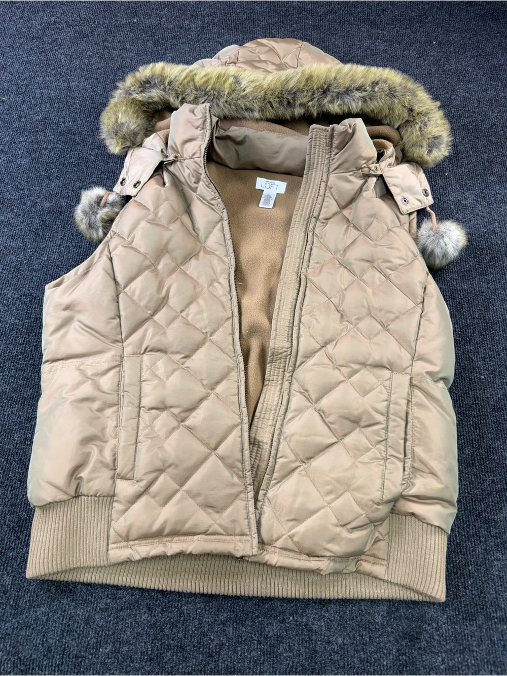LOFT Women's Quilted Hooded Puffer down Vest in Gold taupe color way.